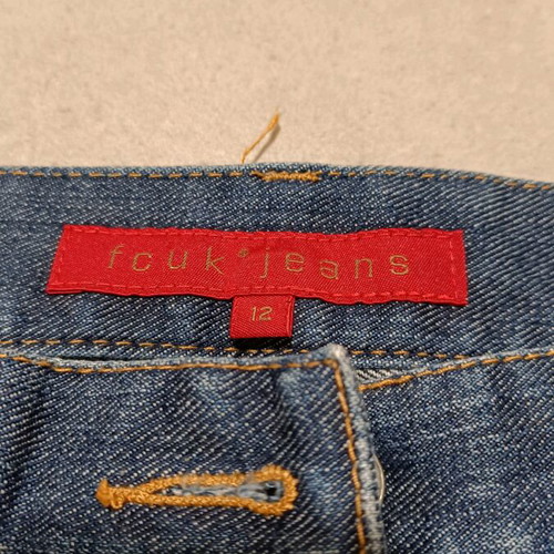 FCUK denim skirt like new, elastic with front slit and pockets