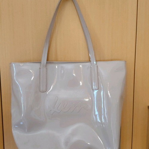 KEM shoulder bag used with imperfections near seams