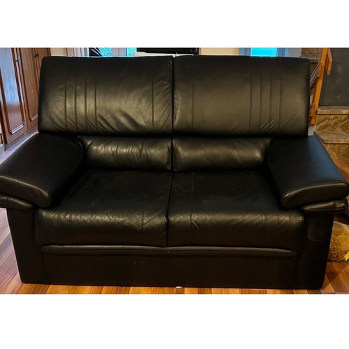 Two-seater sofa made of genuine leather like new