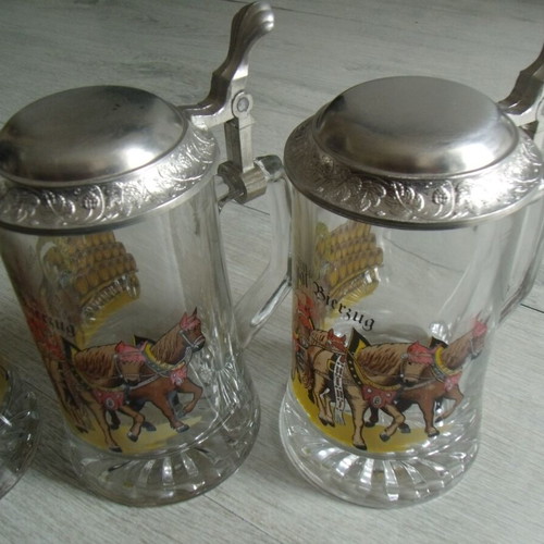 Set of 4 old glass beer steins with metal lids used