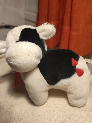 Small cow stuffed animal like new, suitable for children's hands