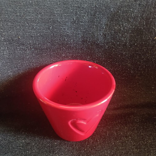 Ceramic pot with embossed heart like new, red color