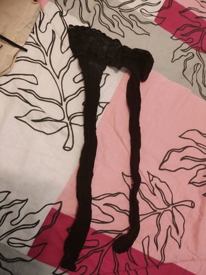 Black garters new, fishnet large