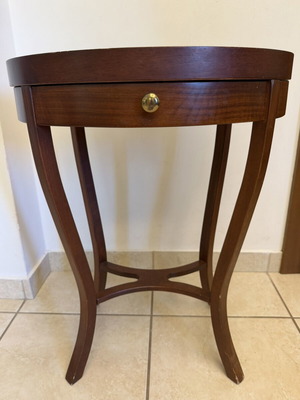 Oval solid wood coffee table with drawer