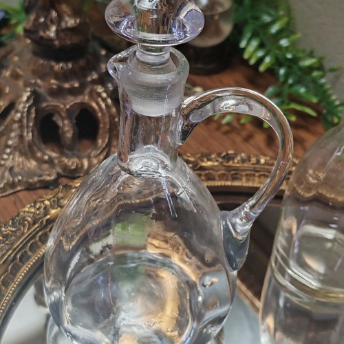 Vintage French glass cruet set for oil and vinegar with ground stoppers