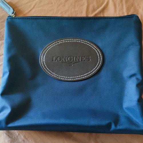 Longines purse used handheld 100% original