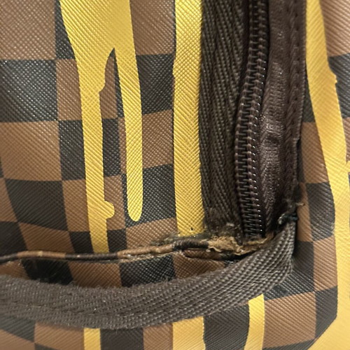 Sprayground That Gold Drip DLXSV Backpack new, black and brown checkered with gold design