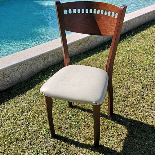 Wooden chair used with beige leather seat dark brown