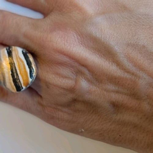 Handmade steel ring with pebble adjustable opening