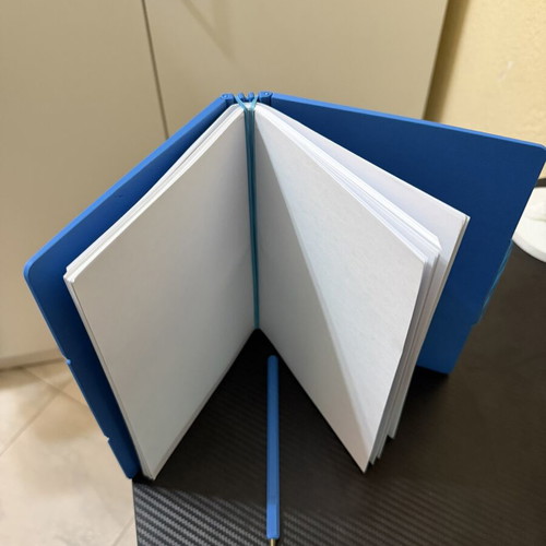 Infinite Notebook custom made with pen holder and refillable pages