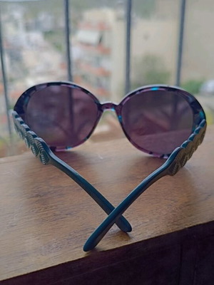 Prada sunglasses like new, green lenses, impressive arms