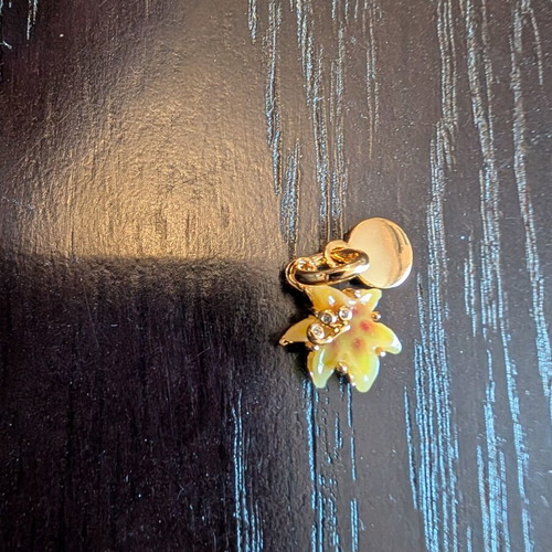 Yellow flower charm with gold details, S925