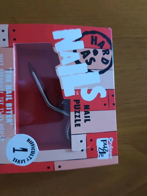 Metal Puzzle Professor Puzzle The Nail Biter new