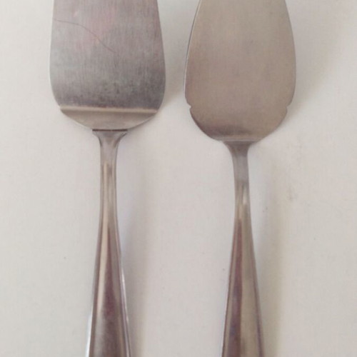 Set of 2 Afentakis stainless steel serving spatulas used