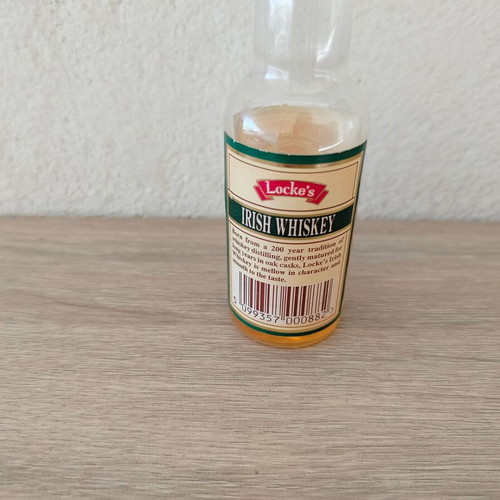 Locke's Irish Whiskey small promotional bottle used