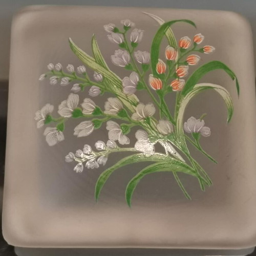 Glass vintage jewelry box used with floral decoration on lid