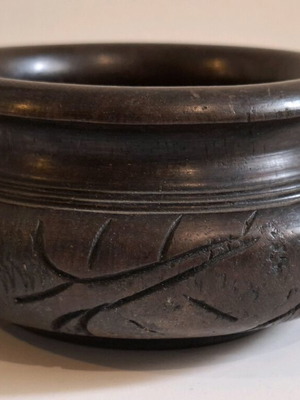 Wooden bowl like new with carved designs, dark, low