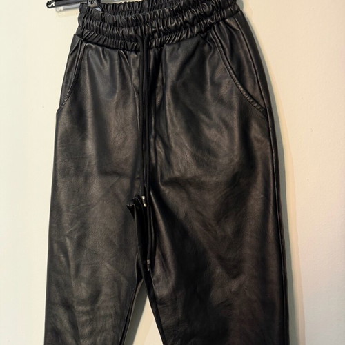 Women's black leather balloon or jogger pants used, with elastic waist and cuffs