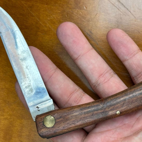 Vintage folding pocket knife with wooden handle, used, 10.7 cm