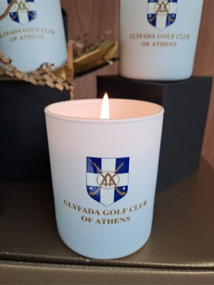 Thematic cinnamon scented candle new with Golf Glufadas emblem