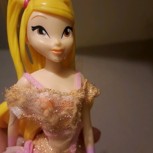 Winx doll used with slightly torn top