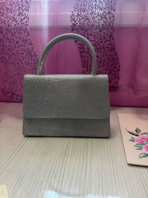 Silver shiny handbag like new