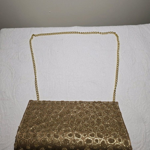 Gold Clutch with Chain like new, elegant embroidered glitter design