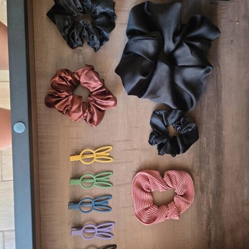 Variety scrunchies and clips used, multicolor