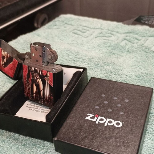Zippo used collectible lighter with Rae design