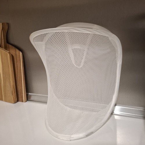 Foldable mesh storage basket white used for laundry and toys