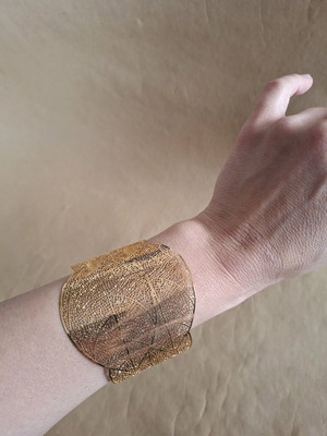 Bracelet lace-like used, gold-colored