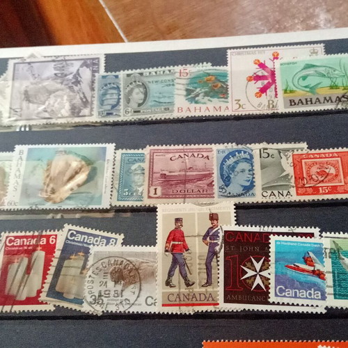 Stamp album with some stamps, mostly cancelled
