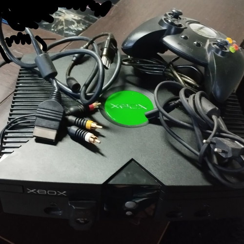 Original Microsoft Xbox console with controller and cables