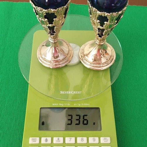 Pair of cobalt glass vases used with silver bases