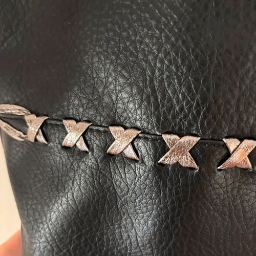 Black shoulder bag tote style like new with inner pockets and silver handle detail