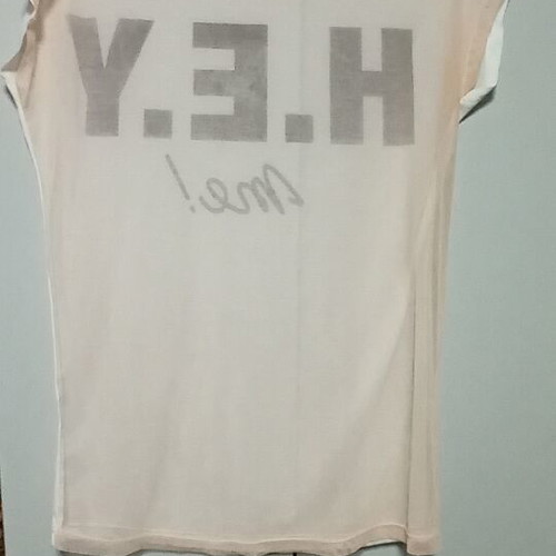 White women's short-sleeve t-shirt with tulle on back used