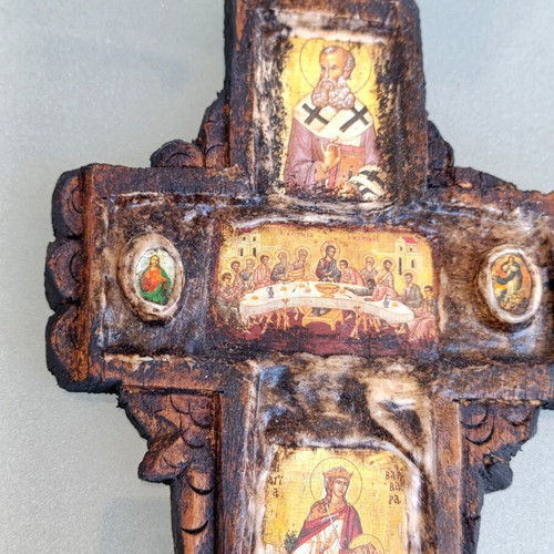 Wooden cross decorated with icons