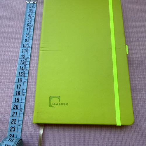 Lined notebook with cover defect