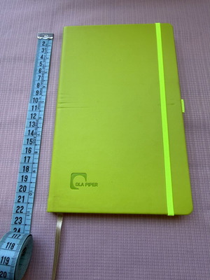 Lined notebook with cover defect