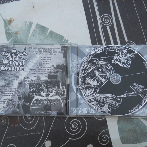 Winds Of Genocide / Abigail Satanik Apokalyptic Kamikaze Kommandos CD album
