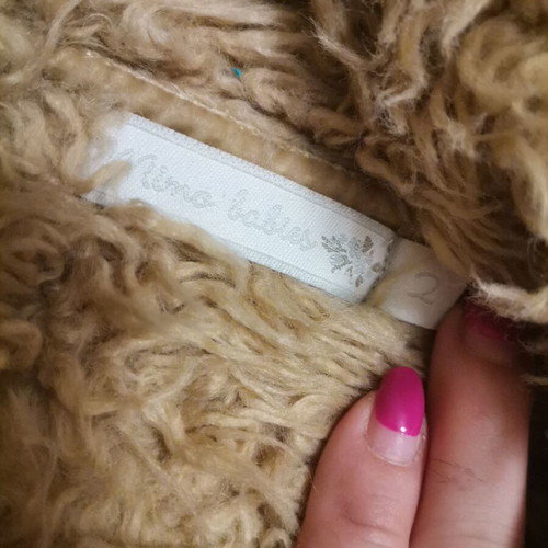 Mouton coat like new for 2-year-old with fur lining