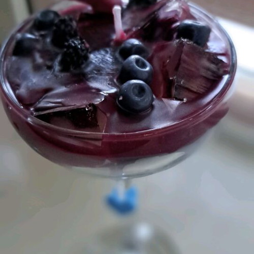 Soy and gel wax candle in cocktail glass with strawberry and blueberry scent