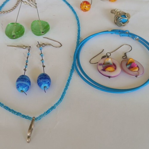 Various jewelry set like new with earrings, pendants, and ring