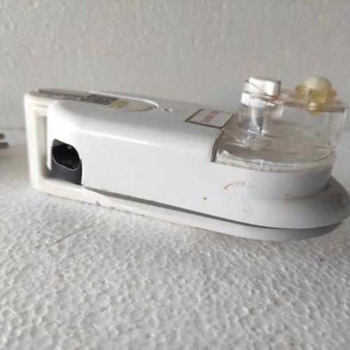 Mini travel iron like new with water and foldable design