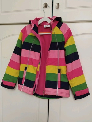 Children's waterproof jacket like new, multicolored for ages 6-7