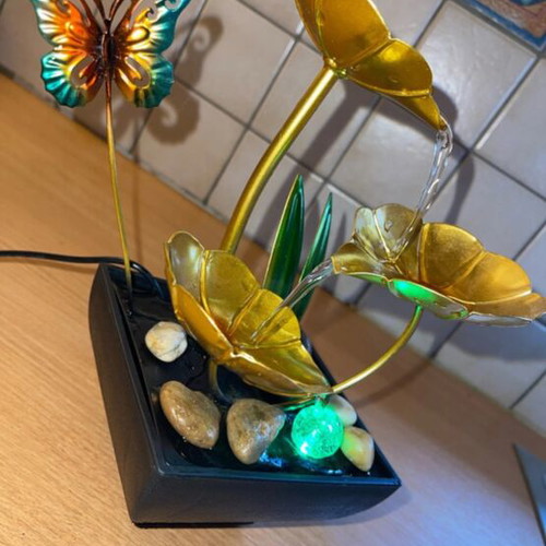 Indoor fountain with LED lighting and stones