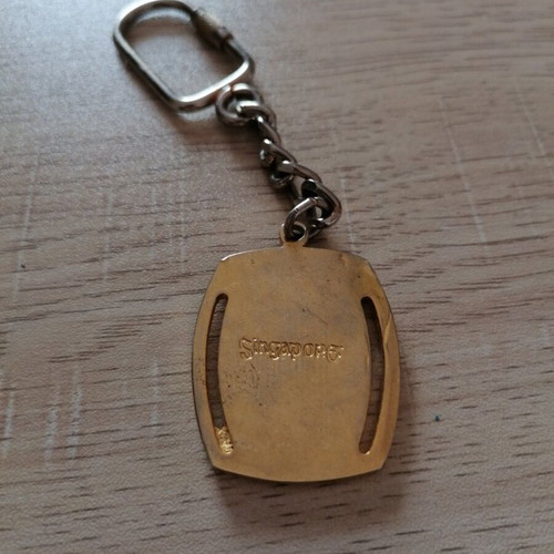 Vintage Singapore keychain used, metal, gold and silver colors