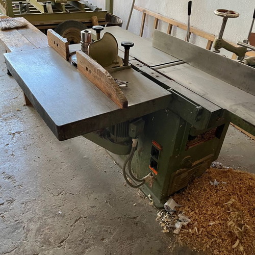 Woodworking machines used, set with bandsaw, planer, press