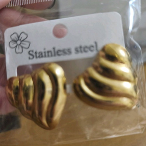 Heart-shaped clip-on earrings new, gold color with embossed design