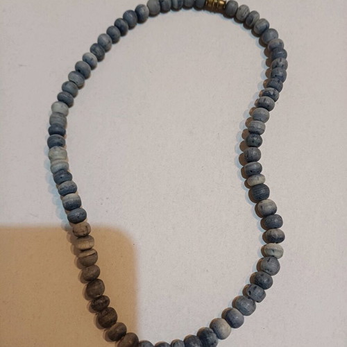 Necklace used with porous blue-gray stones from Thailand
